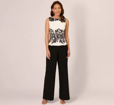 Adrianna Papell Sleeveless Peplum Jumpsuit With Scroll Lace Details In Ivory Black IVORY-BLACK Store